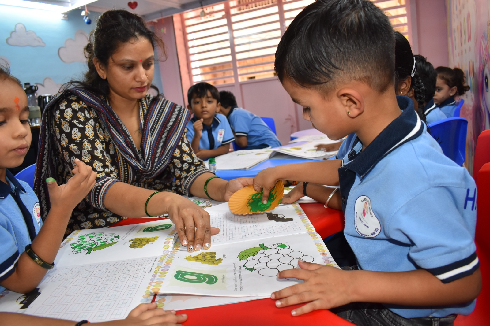 One-on-one attention during a writing exercise