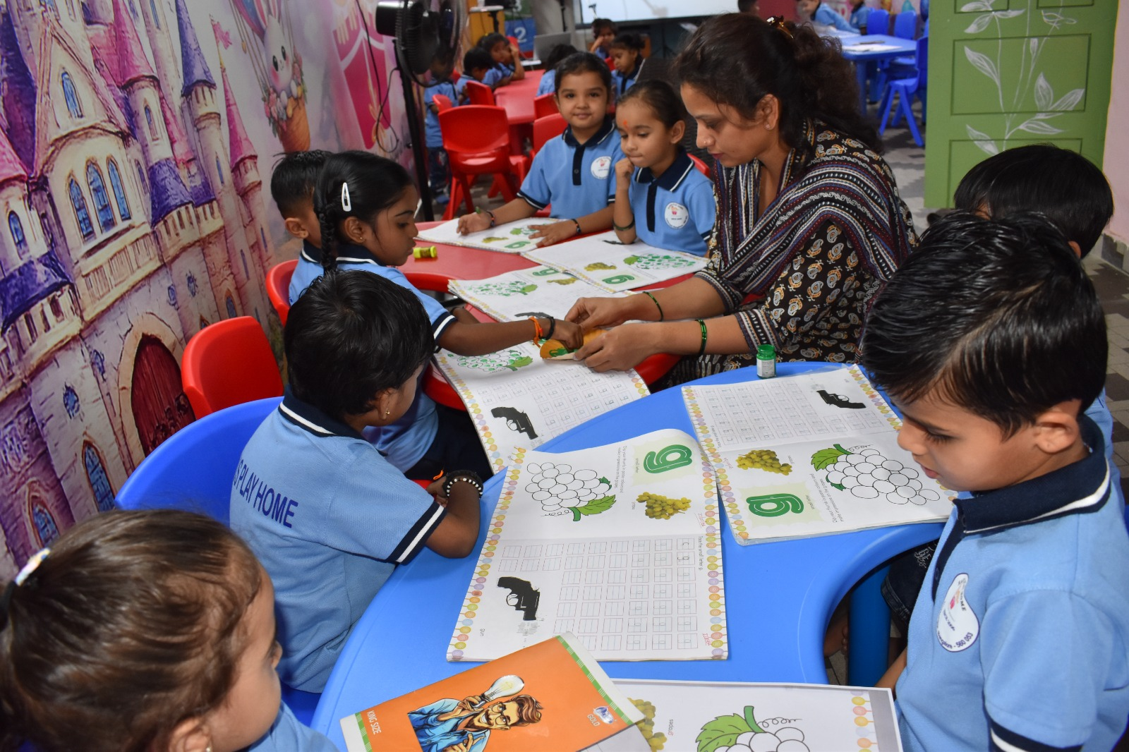 Children working together at their table